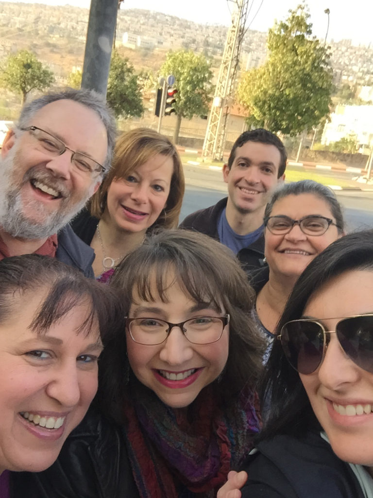 Delegates from the United States visited Tiberias, Israel as part of their trip. Bottom row from left to right: Michelle Lafferty, Dana Rubin-Winkelman, and Diana Azimov Top row from left to right: Mitchell Wittenberg, Susan Esser-Greenberg, Greg Parrish, Michal Maybello. Not pictured is Steve Eigen. Submitted photo.