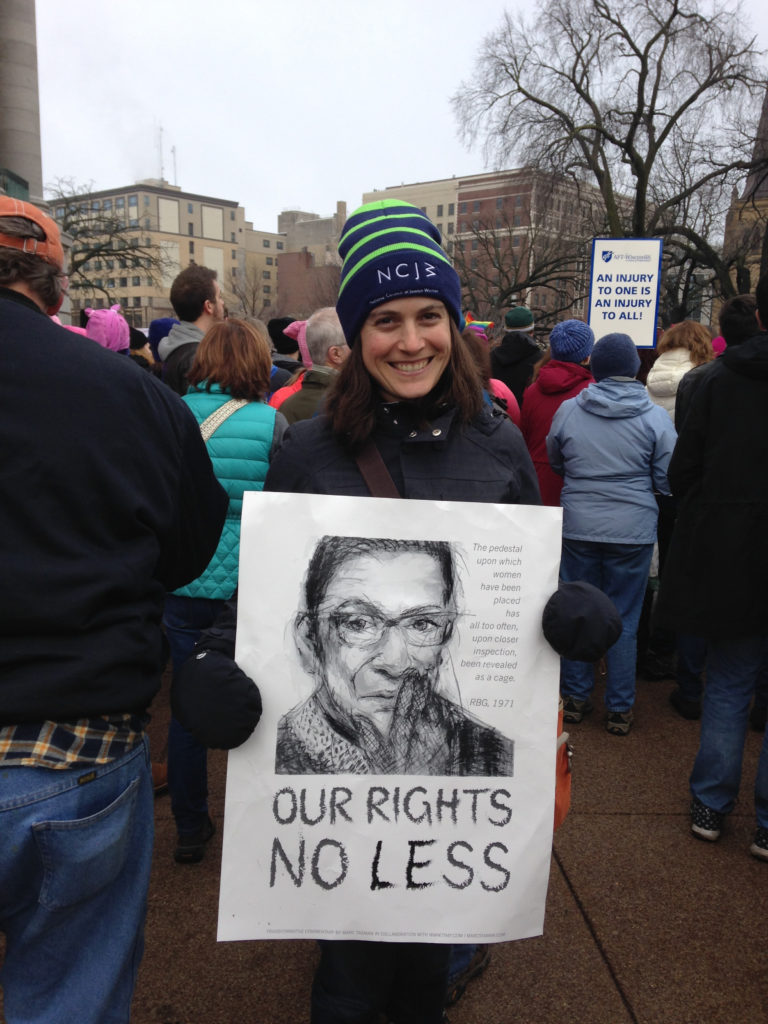 Andrea Bernstein, president of the National Council of Jewish Women – Milwaukee Section, attended the Women’s March on Madison on Jan. 21. She holds an image of U.S. Supreme Court Associate Justice Ruth Bader Ginsberg. Photo by Susan Angel Miller.
