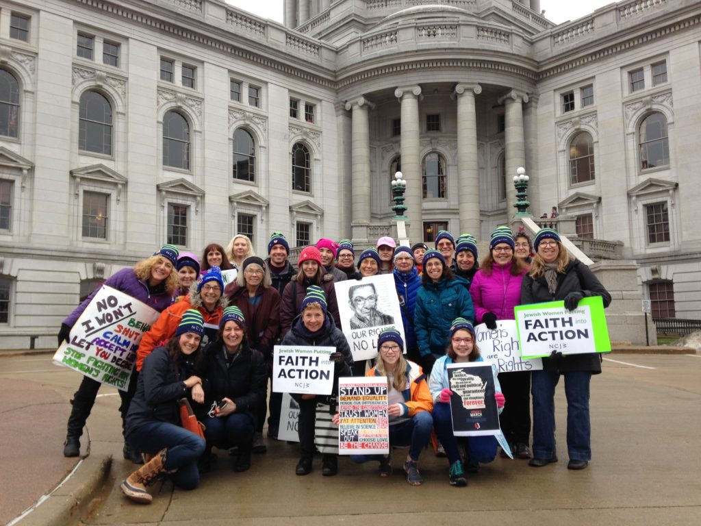 Some who attended the Women’s March on Madison with the National Council of Jewish Women – Milwaukee Section pose in front of the Wisconsin State Capitol, where thousands of marchers arrived and cheered on various speakers. Photo by Rick Strait.